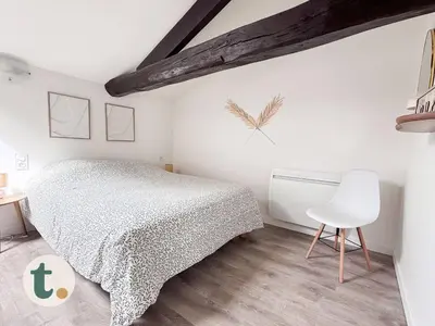 Un ou plusieurs lits dans un hébergement de l'établissement Tranquiloue - Petit Appartement - 10min Puy du Fou