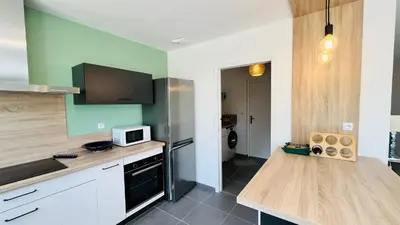 Cuisine ou kitchenette dans l'établissement Maison Océan, standing et plage