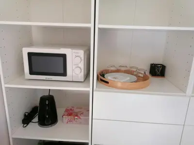 Cuisine ou kitchenette dans l'établissement Bienvenue chez nous