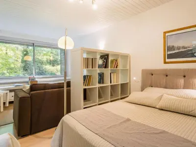Un ou plusieurs lits dans un hébergement de l'établissement Gîte Contemporain avec Jardin et Parking à La Chapelle-sur-Erdre - FR-1-306-1309