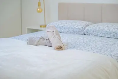 Un ou plusieurs lits dans un hébergement de l'établissement Très bel appartement lumineux et au calme - 2 personnes