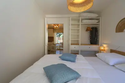 Un ou plusieurs lits dans un hébergement de l'établissement Le Belouga By Tranquil at Home