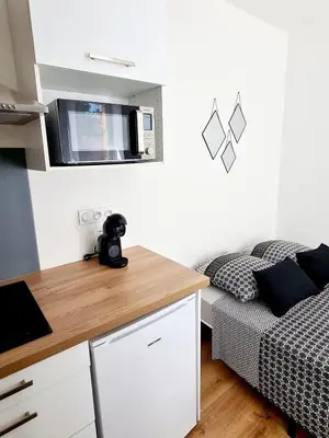 Cuisine ou kitchenette dans l'établissement Studio 1 Cozy en centre-ville - Puy duFou