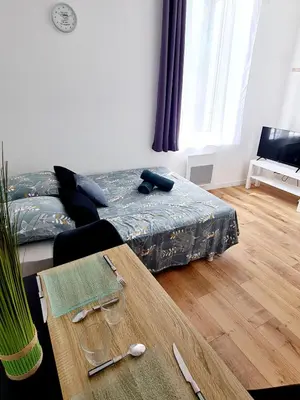 Un ou plusieurs lits dans un hébergement de l'établissement Studio 2 Cosy en centre-ville - Puy duFou