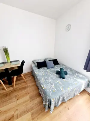 Un ou plusieurs lits dans un hébergement de l'établissement Studio 2 Cosy en centre-ville - Puy duFou