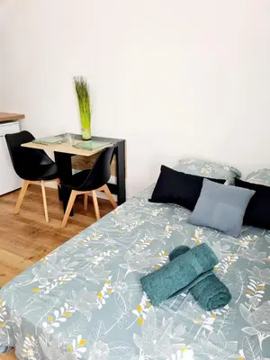 Un ou plusieurs lits dans un hébergement de l'établissement Studio 2 Cosy en centre-ville - Puy duFou