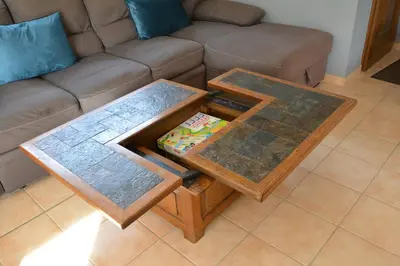 Coin salon dans l'établissement Maison au calme avec jardin & étang 25 min du Puy du F