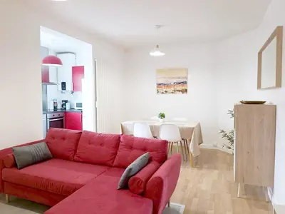 Coin salon dans l'établissement Le Pontchâtelain T3 Hypercentre