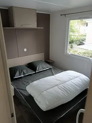 Un ou plusieurs lits dans un hébergement de l'établissement mobilhome