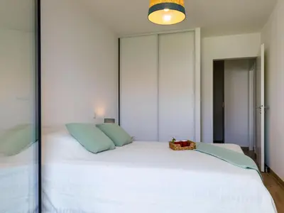 Un ou plusieurs lits dans un hébergement de l'établissement Apartment Océanide-1 by Interhome