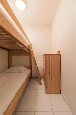 Un ou plusieurs lits dans un hébergement de l'établissement L'Athéna By Tranquil at Home