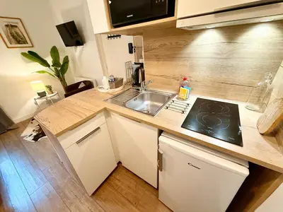 Cuisine ou kitchenette dans l'établissement Alizé Studio COSY dans résidence Privée avec Patio à proximité