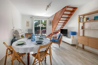 Coin salon dans l'établissement Maison pour 4 avec terrasse - proche du centre