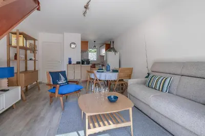 Coin salon dans l'établissement Maison pour 4 avec terrasse - proche du centre