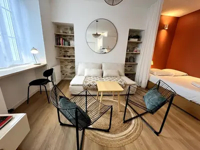 Un ou plusieurs lits dans un hébergement de l'établissement Darbefeuille, grand studio centre ville 2 personnes