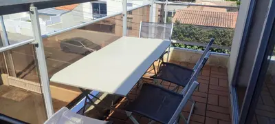 Balcon ou terrasse dans l'établissement Appartement T2 450m de la plage des demoiselles, avec garage et possibilité de vélos à 950m de la rue piétonne