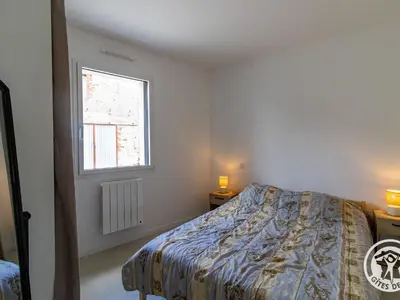 Un ou plusieurs lits dans un hébergement de l'établissement Gîte moderne avec jardin clos et animaux admis près de Nantes et Angers - FR-1-622-108