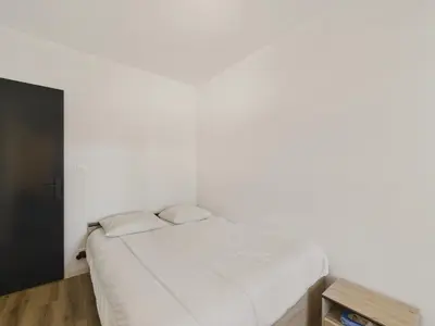 Un ou plusieurs lits dans un hébergement de l'établissement 200m de la mer - Appartement pour 4 avec balcon