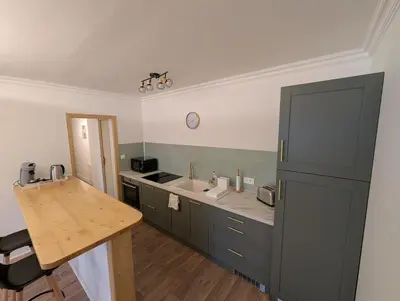 Cuisine ou kitchenette dans l'établissement Gite de la Bretinière