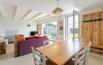 Coin salon dans l'établissement Charmante Maison Proche Mer