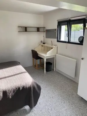 Un ou plusieurs lits dans un hébergement de l'établissement T3 rez de jardin