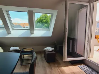 Coin salon dans l'établissement Studio Neuf 23m² Proche Plage et Centre Tout Inclus - FR-1-364-183