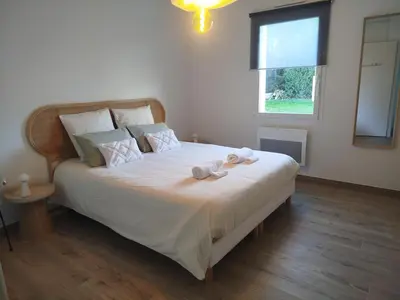 Un ou plusieurs lits dans un hébergement de l'établissement Chambres d'hôtes