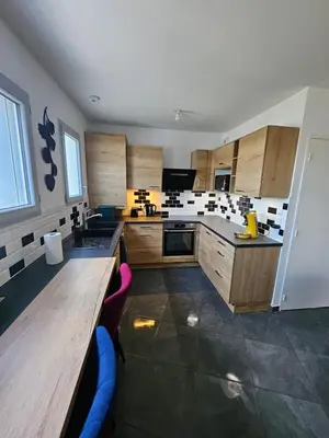 Cuisine ou kitchenette dans l'établissement Cozy Family