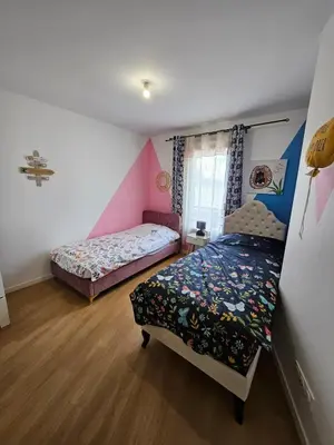 Un ou plusieurs lits dans un hébergement de l'établissement Cozy Family