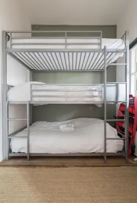 Un ou plusieurs lits dans un hébergement de l'établissement Élégant appartement place du Marché, 2 chambres, tout confort