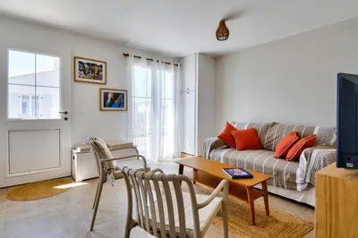 Coin salon dans l'établissement 700 m de la plage - jardin - maison pour 6