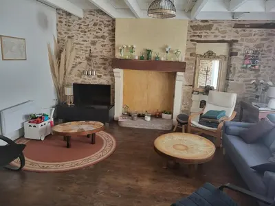 Coin salon dans l'établissement Charmante maison de village 30 min Puy DuFou