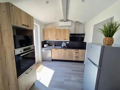 Cuisine ou kitchenette dans l'établissement Appartement 