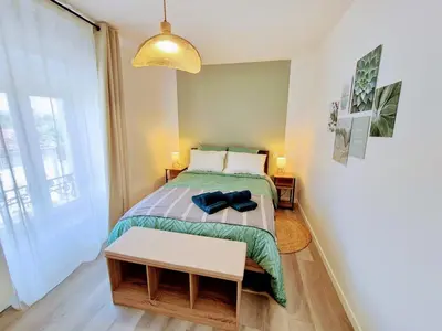 Un ou plusieurs lits dans un hébergement de l'établissement Appartement 