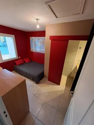 Un ou plusieurs lits dans un hébergement de l'établissement Chambre chez nous