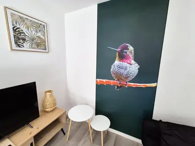 Télévision ou salle de divertissement dans l'établissement Appartement 
