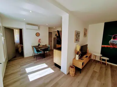 Télévision ou salle de divertissement dans l'établissement Appartement 