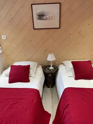 Un ou plusieurs lits dans un hébergement de l'établissement Villa La Dune aux Loups