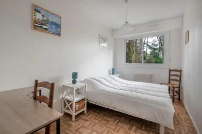 Un ou plusieurs lits dans un hébergement de l'établissement Appartement RDC pour 4 à 800m de la mer