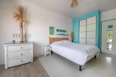 Un ou plusieurs lits dans un hébergement de l'établissement Vue mer, plage à 50m, Maison pour 4