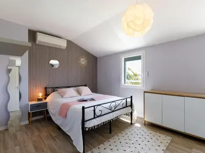 Un ou plusieurs lits dans un hébergement de l'établissement Holiday Home Villa Sunset by Interhome