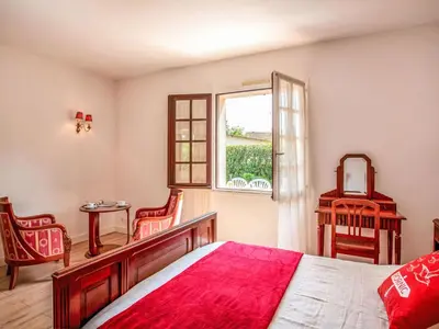 Un ou plusieurs lits dans un hébergement de l'établissement Holiday Home Le Pré Vincent by Interhome
