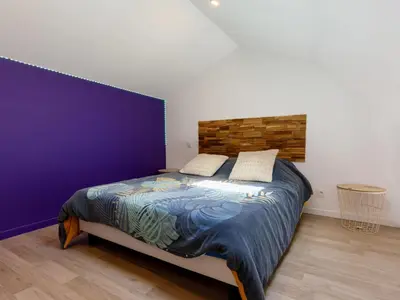 Un ou plusieurs lits dans un hébergement de l'établissement Holiday Home La Perle de Jade-1 by Interhome