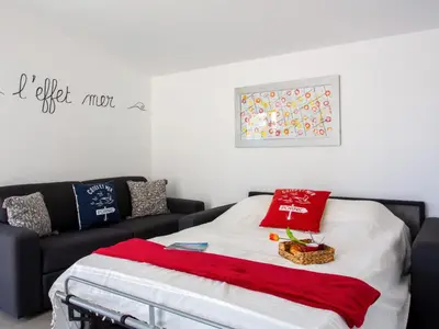 Un ou plusieurs lits dans un hébergement de l'établissement Holiday Home L'Effet Mer by Interhome