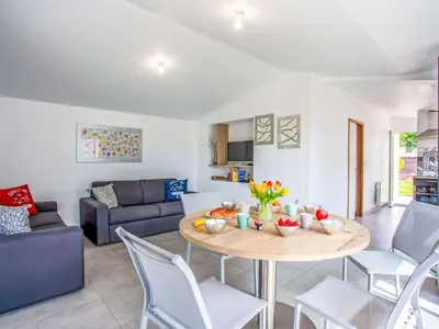 Coin salon dans l'établissement Holiday Home L'Effet Mer by Interhome