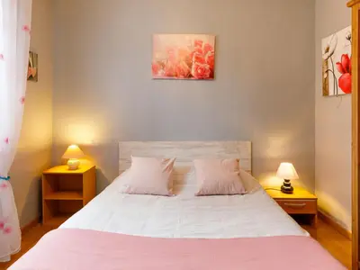Un ou plusieurs lits dans un hébergement de l'établissement Holiday Home L'Horizon by Interhome