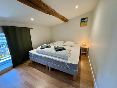 Un ou plusieurs lits dans un hébergement de l'établissement Maison pleine de charme entre terre et mer