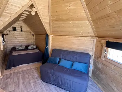 Coin salon dans l'établissement logement insolite KOTA
