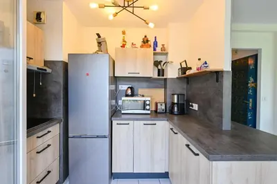Cuisine ou kitchenette dans l'établissement L'Appart du Marché - A quelques min de la plage