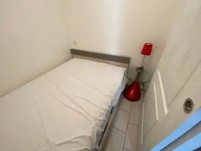 Un ou plusieurs lits dans un hébergement de l'établissement Studio bord de mer Max 4 personnes